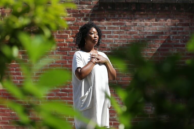 Adriana Adele, who teaches yoga, near her home in Philadelphia. "There’s a lot of emotional processing that happens on a deeper level when we give ourselves the time to slow down and breathe,” she says.