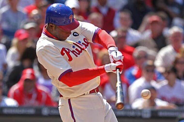 John Mayberry hits a game-tying solo home run in the bottom of the seventh inning. (Michael Bryant/Staff Photographer)
