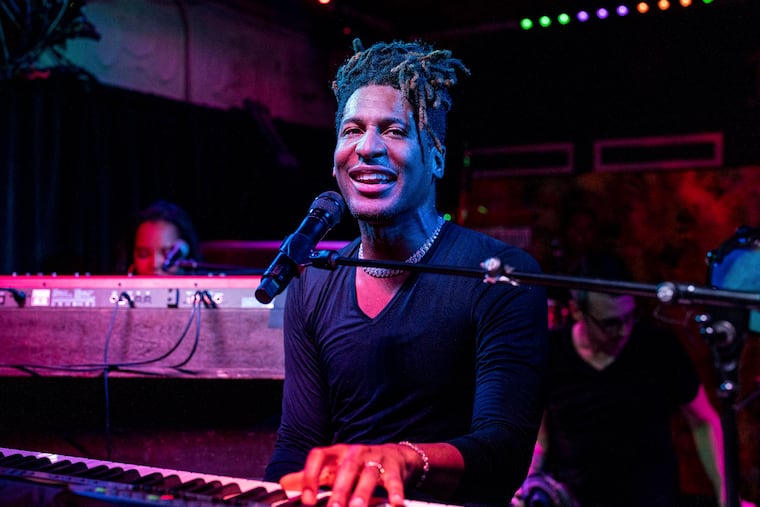 FILE - Jon Batiste performs at the Maple Leaf Bar in New Orleans in May 2. The singer-songwriter and multi-instrumentalist new album 'World Music Radio.' (Photo by Amy Harris/Invision/AP, File)