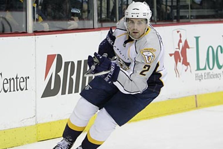 The Flyers have until July 1 to negotiate exclusively with defenseman Dan Hamhuis. (Mark Humphrey/AP file photo)