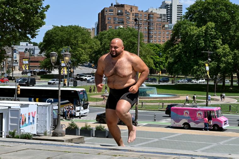 Abdelraham Shalan runs up the Rocky Steps at the Philadelphia Museum of Art Thursday, May 30, 2024.