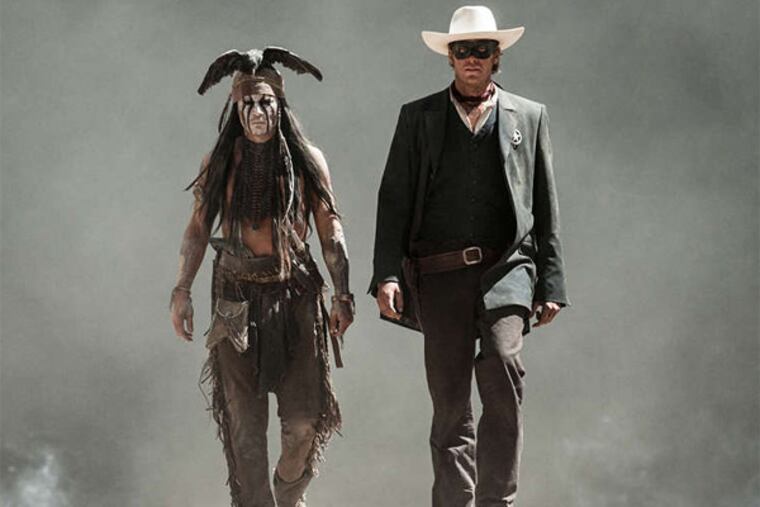 Johnny Depp (left) as Tonto and Armie Hammer as "The Lone Ranger." The crew spent nine months in five Western states, and Hammer and his costars went through three weeks of riding "boot camp."