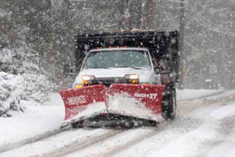 As a steady snow fell this morning, a snow plow makes its way down Rose Valley Road in Rose Valley. (Ed Hille / Staff Photographer )