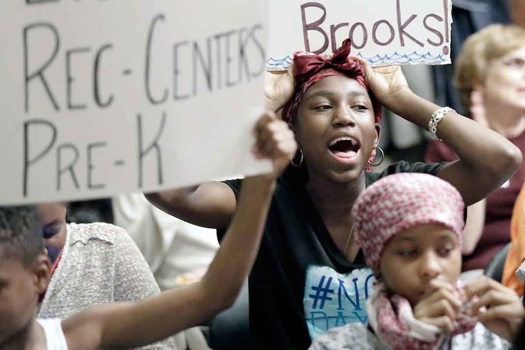 Teayanna Thompson shouts support for the soda tax. The measure was passed by City Council, but a court challenge is expected.