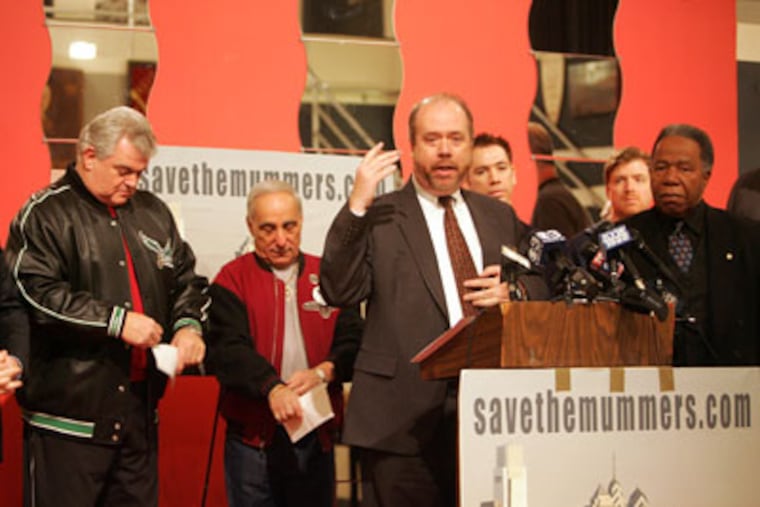 George Badey, an attorney for the Mummers, speaks at a press conference announcing the New Year's parade will strut on thanks to the generosity of area residents and businesses. (David Swanson / Staff Photographer)