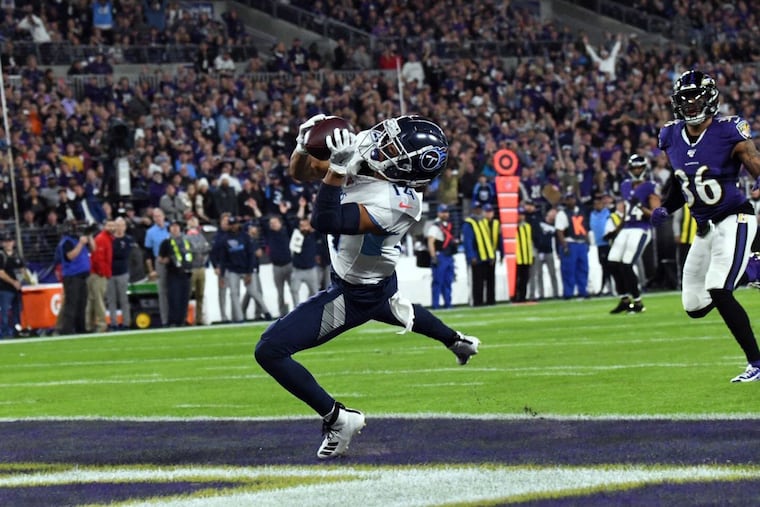 Titans receiver Kalif Raymond catches a touchdown pass in the second quarter.