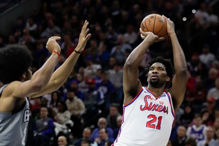Sixers center Joel Embiid and teammate Tobias Harris were among the 80 players on Friday's call in which players discussed their concerns about resuming the season next month in Orlando.