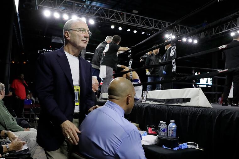 Boxing promoter J Russell Peltz makes his way around the ring Friday night at an event honoring his 50 years as a promoter.