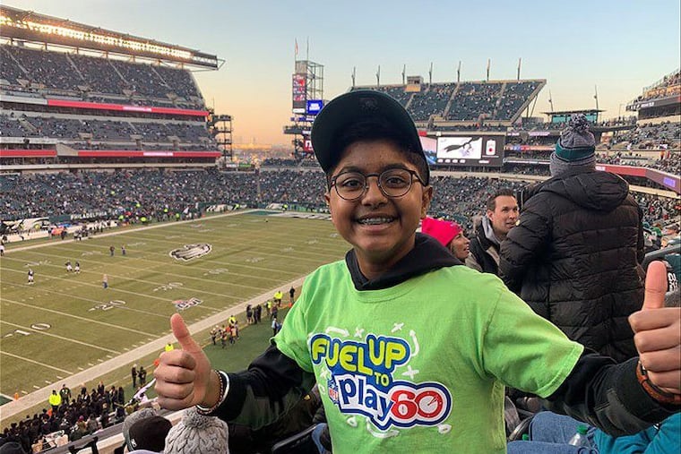 Samarth Mannikeri, photographed at an Eagles game in December, will be part of the NFL draft in a prerecorded message about the league's Fuel Up to Play 60 program.