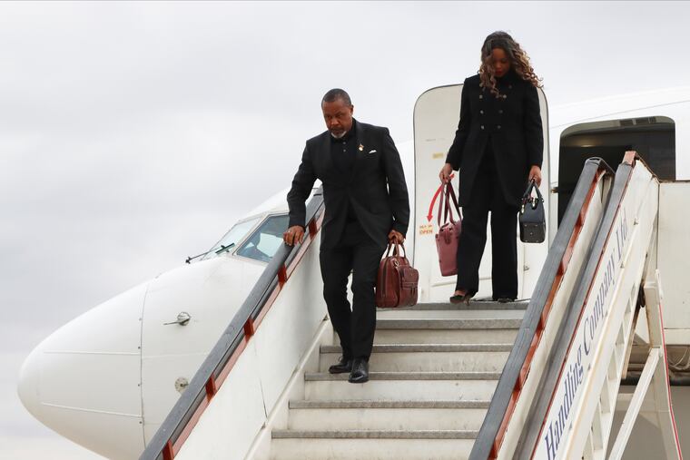 Malawi Vice President Saulos Chilima, left, and his wife Mary disembark from a plane in Lilongwe, the capital of Malawi, on Sunday, June 9, 2024.