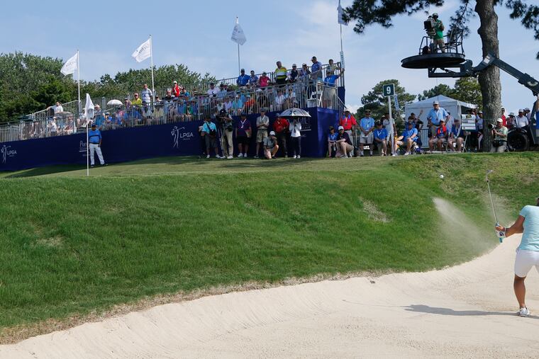 Nasa Hataoka, of Japan, hits out of the bunker on the ninth hole during the final round of the Pure Silk Championship golf tournament at Kingsmill Resort, in Williamsburg, Va., Sunday, May 26, 2019.