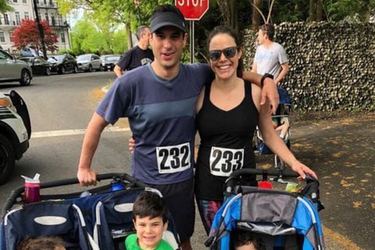 Michael Zelin and wife Lauren Zelin with their children days before Zelin visited the emergency room for soreness in his arm.