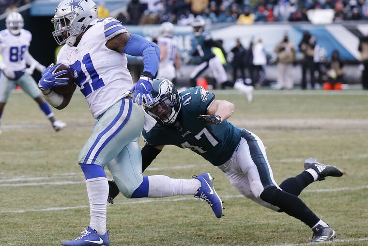 Eagles linebacker Nate Gerry goes after Dallas Cowboys running back Ezekiel Elliott on Sunday, December 31, 2017 in Philadelphia. YONG KIM / Staff Photographer