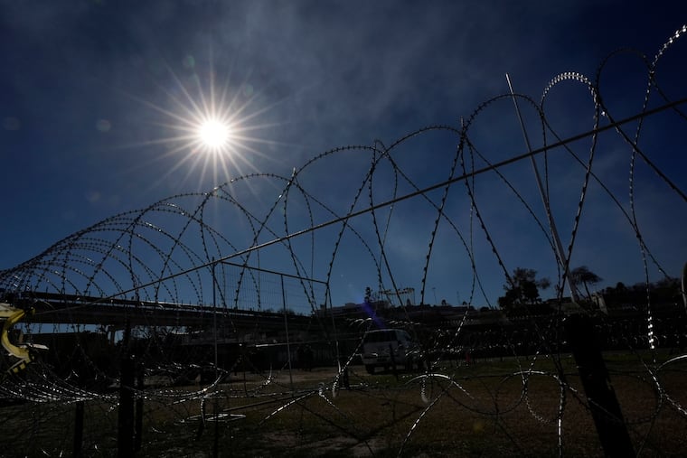 Wire is stretched through Shelby Park where Texas Gov. Greg Abbott and fellow Governors held a news conference along the Rio Grande to discuss Operation Lone Star and border concerns on Sunday, Feb. 4, 2024, in Eagle Pass, Texas.