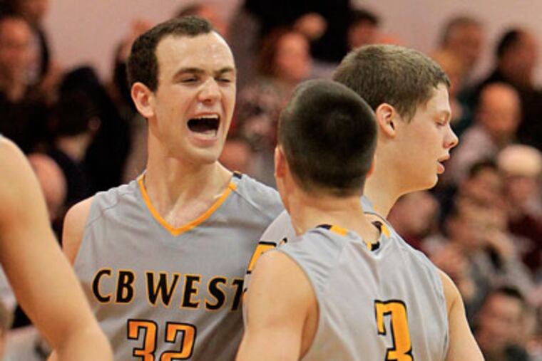 Central Buck West Derek Dyer,left, and Jared Kelly celebrate after a basket by Tyler Schechter,center. Central Buck West vs St. Joseph Prep at Archbishop Ryan on Saturday, March 10, 2012 in 1st round of PIAA AAAA playoffs. ( RON CORTES / STAFF PHOTOGRAPHER ). SPREP11-