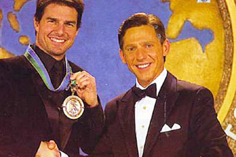 Tom Cruise, left, with David Miscavige, who was born in Bucks County and spent his first 12 years in Willingboro, N.J.