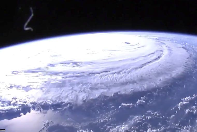 This image provided by NASA shows Hurricane Florence from the International Space Station on Wednesday., S