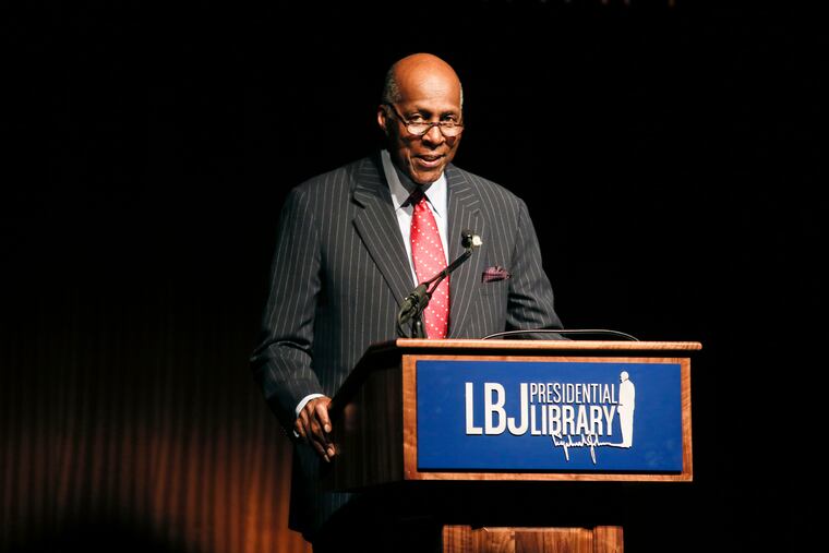 In this April 9, 2014 photo, civil rights activist Vernon Jordan introduces former President Bill Clinton during the Civil Rights Summit in Austin, Texas.