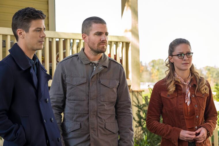 From left: Grant Gustin as Oliver Queen/Green Arrow, Stephen Amell as Barry Allen/The Flash and Melissa Benoist as Kara/Supergirl in the first leg of a three-show crossover that begins Sunday, Dec. 9 with "The Flash"