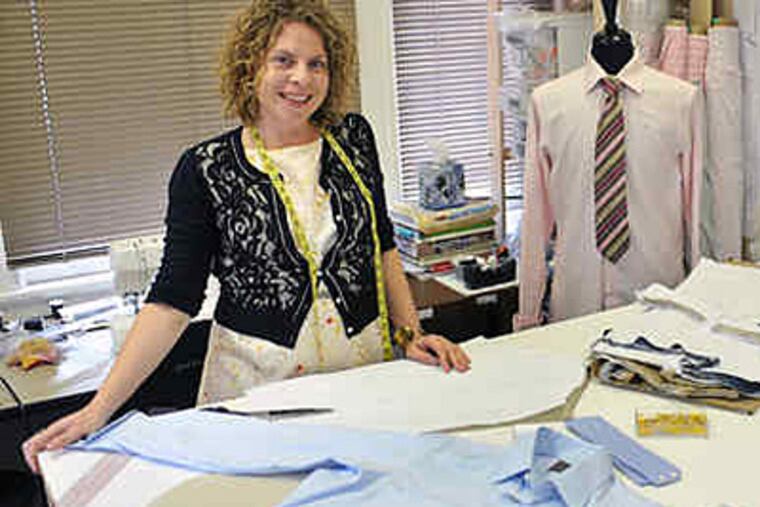 Sarah Van Aken in her design studio on Sansom Street in Philadelphia. A fitting requires 15 measurements. (Sharon Gekoski-Kimmel / Staff Photographer)