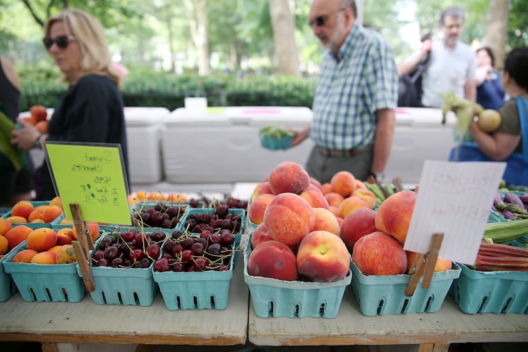 Fruits are displayed at the Rineer Family Farms stand at the Rittenhouse Farmers' Market in Philadelphia's Rittenhouse Square on Saturday, July 6, 2019.
