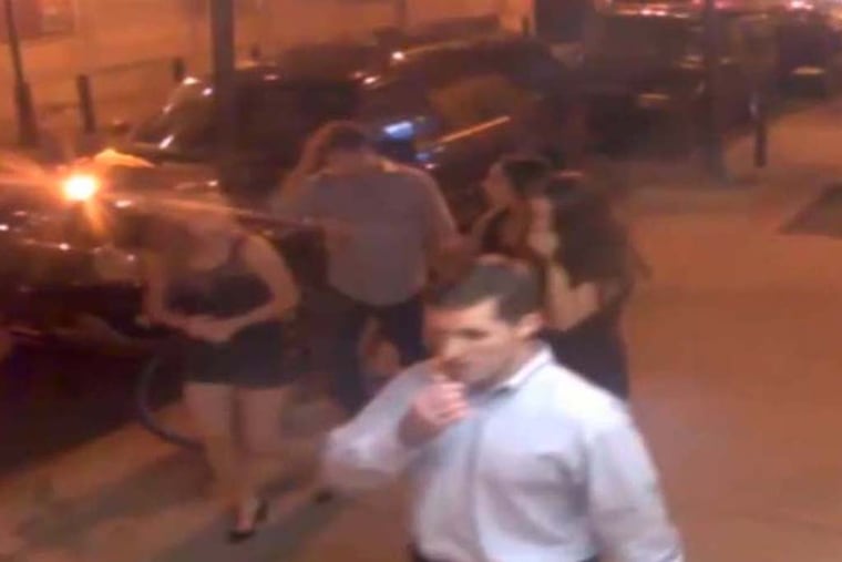 Philadelphia Police released surveillance video of up to 12 people it identified as suspects walking through Center City on Thursday evening near the time of the attack.