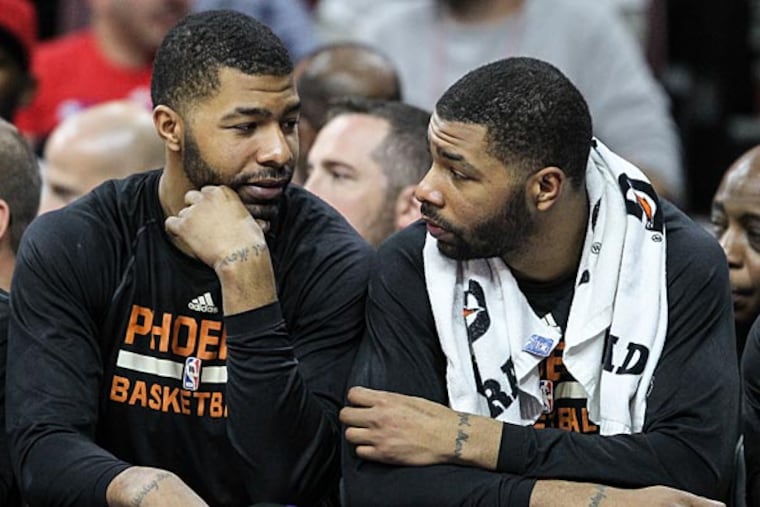 The Morris twins. (Steven M. Falk/Staff Photographer)