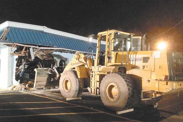 A stolen bulldozer was rammed into The Piston Diner in Westville, N.J. (Frank Kummer / Staff)
