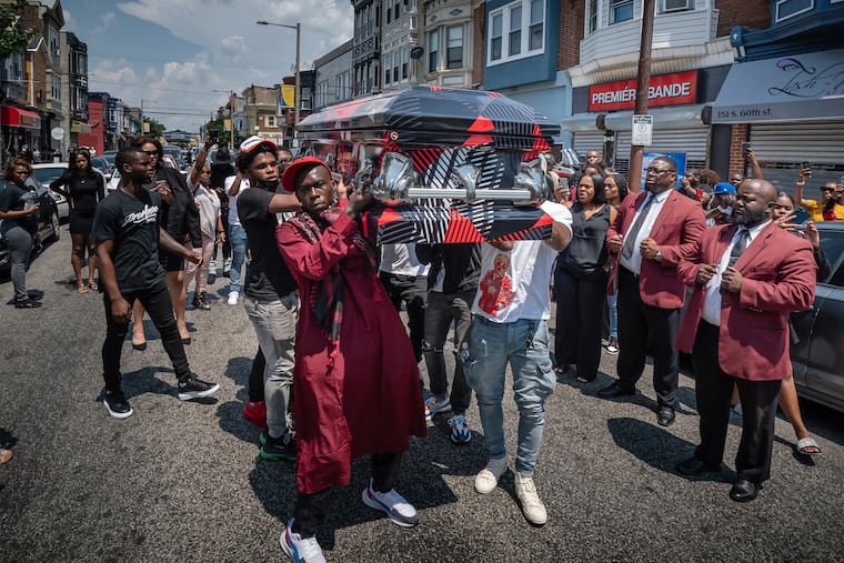 Pallbearers carry the casket of Sircarr Johnson Jr. down 60th Street on July 17, 2021. Johnson's killer was sentenced on Wednesday to 45 to 90 years in prison.