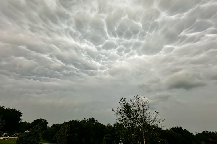 Storm clouds form over a public park as thunderstorms approaches the region, April 25, 2026, in Plano, Texas. Researchers found that rising costs from weather disasters are one reason for rising premiums.