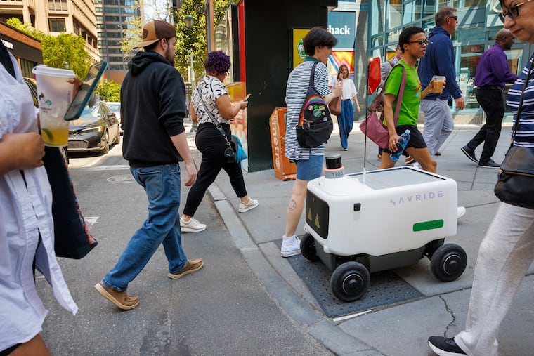 An Uber Eats autonomous food delivery robots at 17th and Chestnut Streets earlier this month.