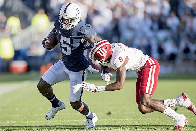Penn State wide receiver DaeSean Hamilton runs with the ball as Indiana defensive back Jonathan Crawford tries to bring him down on Saturday, Sept. 30, 2017, at Beaver Stadium in Universtiy Park, Pa. The host Nittany Lions won, 45-14.