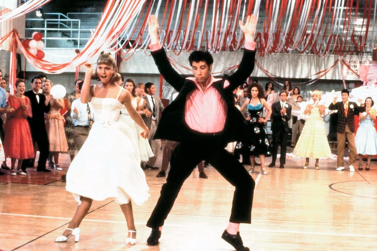 This image released by the Library of Congress shows Olivia Newton-John (left) and John Travolta in a scene from the 1978 film "Grease."