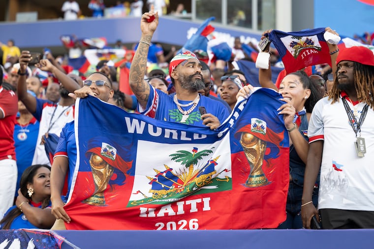 Haiti fans celebrate before their team's World Cup match against Brazil on Friday in Philly.