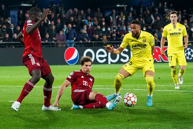 Arnaut Danjuma (right) helped Villarreal beat Bayern in the first game of their UEFA men's Champions League quarterfinal series last Wednesday in Spain.