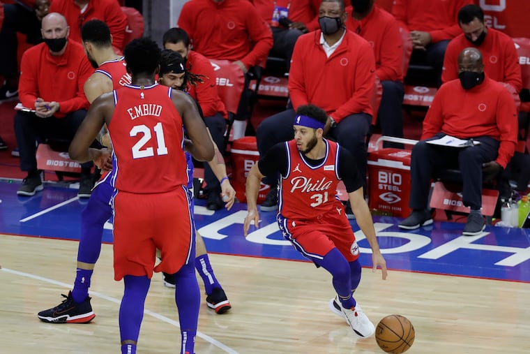 Sixers guard Seth Curry (31) and center Joel Embiid are both listed on the NBA injury report for Sunday's game vs. the Orlando Magic.