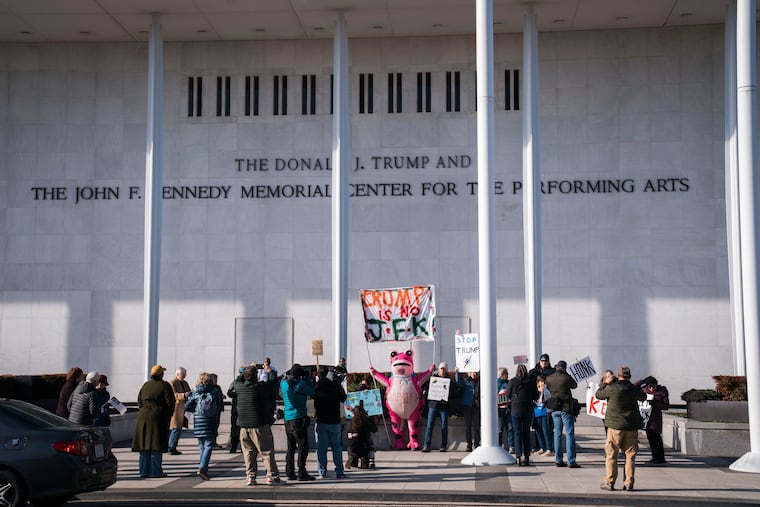 Protesters gather on Dec. 20 in front of the John F. Kennedy Center for the Performing Arts after President Donald Trump’s name was added to the building.