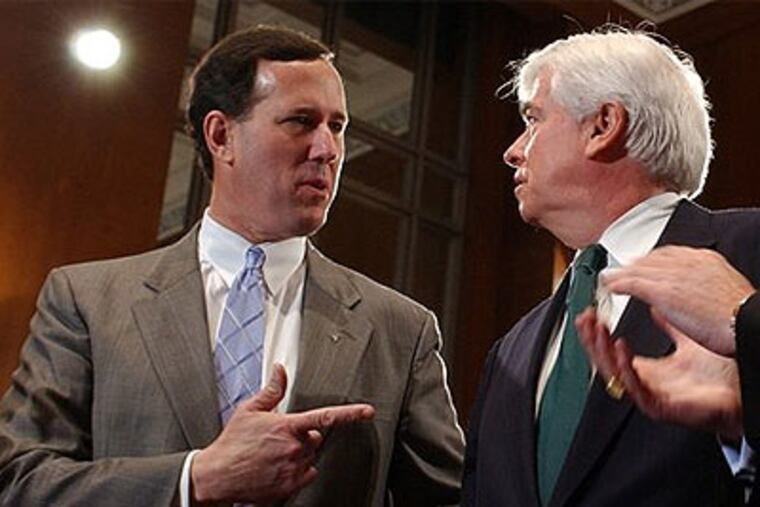 In this April 19, 2005 file photo, then-Sen. Rick Santorum, R-Pa., left, talks with then-Sen. Christopher Dodd, D-Conn., on Capitol Hill in Washington. Rick Santorum boasts that deep conservative values make him a stronger challenger against President Barack Obama this fall than likely GOP nominee Mitt Romney. (AP Photo / Dennis Cook, File)