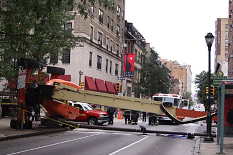 A crane working at the First Presbyterian Church at 21st and Walnut Streets, fell sideways about 1:15 p.m. (Steve Skipton)