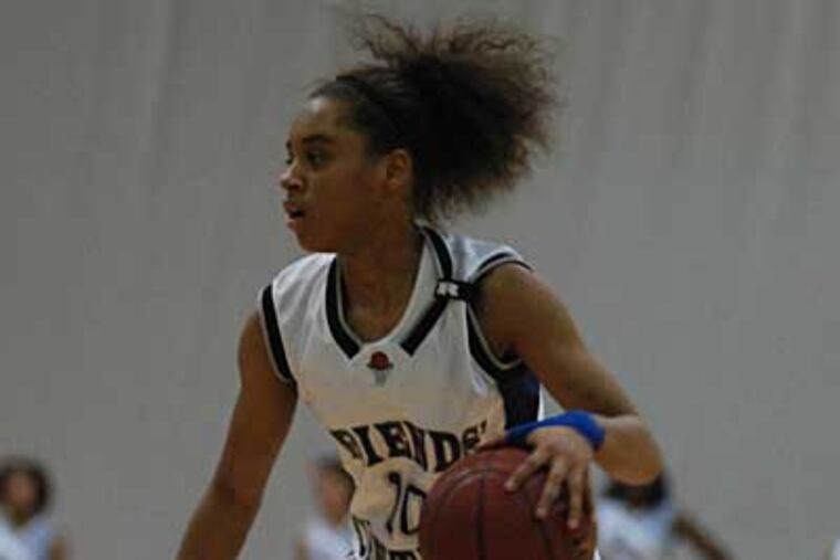 Monaye Merritt of Friends' Central drive down the lane in the Friends Schools League Championship game at Haverford College. ( Amanda Cegielski / Staff Photographer )