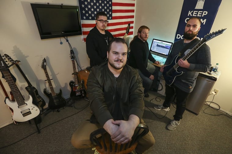 Justin Vigile and his band mates from the band Extractus, (left to right) Sean Potoczny, Michael Serio and Aaron Winthrop during practice in Bensalem on Monday, January 29, 2018. Their heavy metal band provides soundtracks for NFL Films programming.