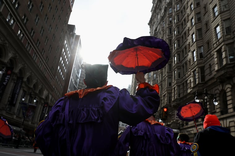 Mummers march down South Broad Street during the annual Mummers Parade on Jan. 1, 2020. A Philadelphia city official who oversaw the parade has now been charged with embezzlement.