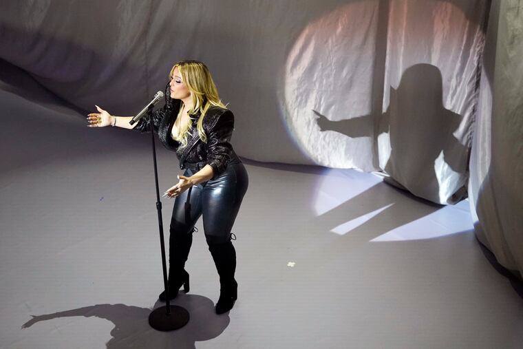 Singer Bebe Rexha performs during halftime of an NFL football game between the Detroit Lions and the Buffalo Bills, Thursday, Nov. 24, 2022, in Detroit. (AP Photo/Carlos Osorio)