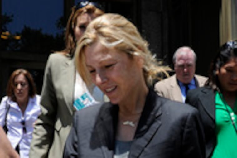 Actress Tatum O'Neal leaves Manhattan Criminal Court after Monday's arraignment on drug charges.