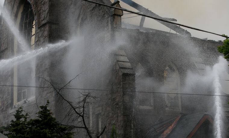 As St. Leo's arson investigation continues, the historic church's fire  rallies — and roils — Tacony neighborhood