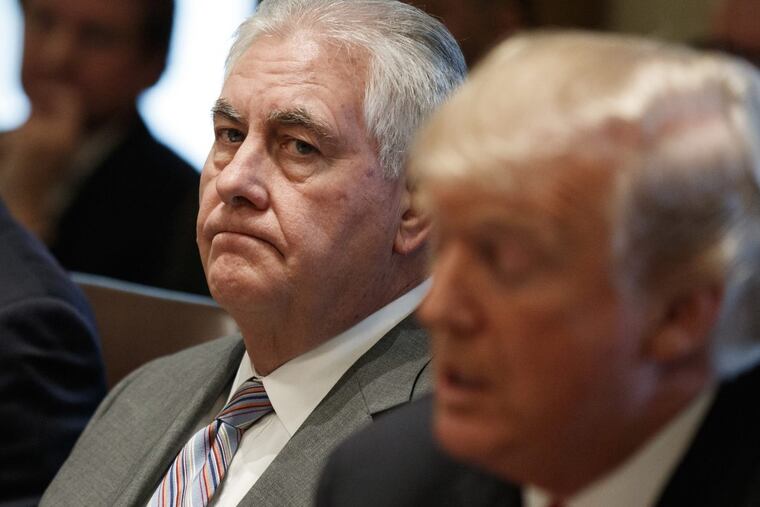 FILE – In this Jan. 10, 2018 file photo, Secretary of State Rex Tillerson listens as President Donald Trump speaks during a cabinet meeting at the White House in Washington. Tillerson is out as secretary of state. President Trump tweeted this morning that he’s naming CIA director Mike Pompeo to replace him. (AP Photo/Evan Vucci)