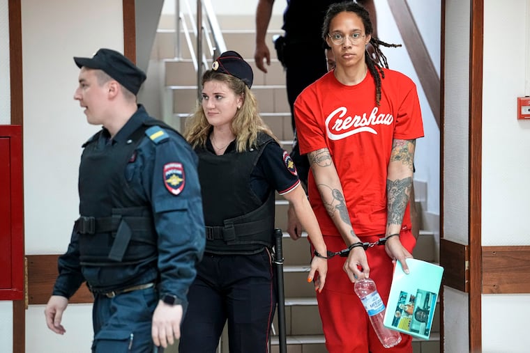 Brittney Griner is escorted to a courtroom for a hearing, in Khimki, just outside Moscow, on Thursday.