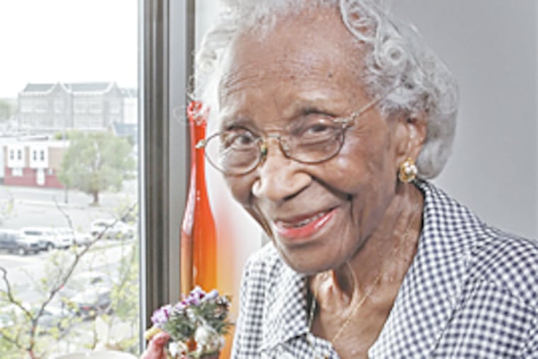 Viola Walker turns 103 today. She has witnessed both the struggle for gender and racial equality. Now, she'll have her pick of candidates. (Steven M. Falk / Daily News)