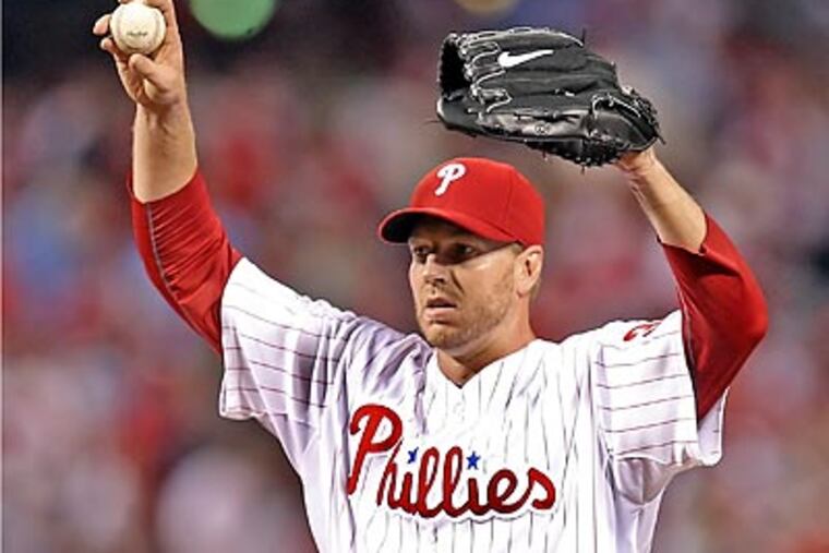 The Phils could line up a potential roatation of Halladay (above), Hamels, and Oswalt to face the Braves.. (Steven M. Falk/Staff Photographer)