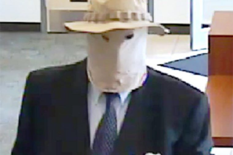 Richard Boyle, who earned the moniker "The Straw Hat Bandit" after a string of 19 bank robberies, appears in surveillance video image during one of his hits.